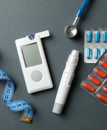 diabetes-accessories-on-black-background-top-view-2021-09-02-22-22-15-utc-768x512